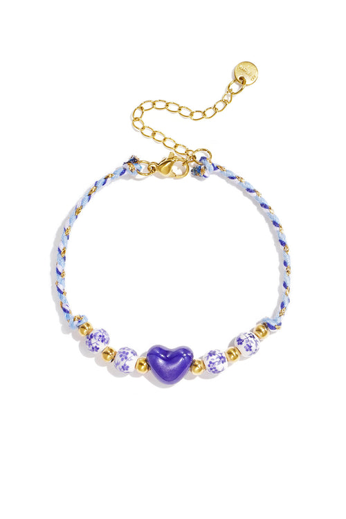 Braided bracelet with design and heart beads