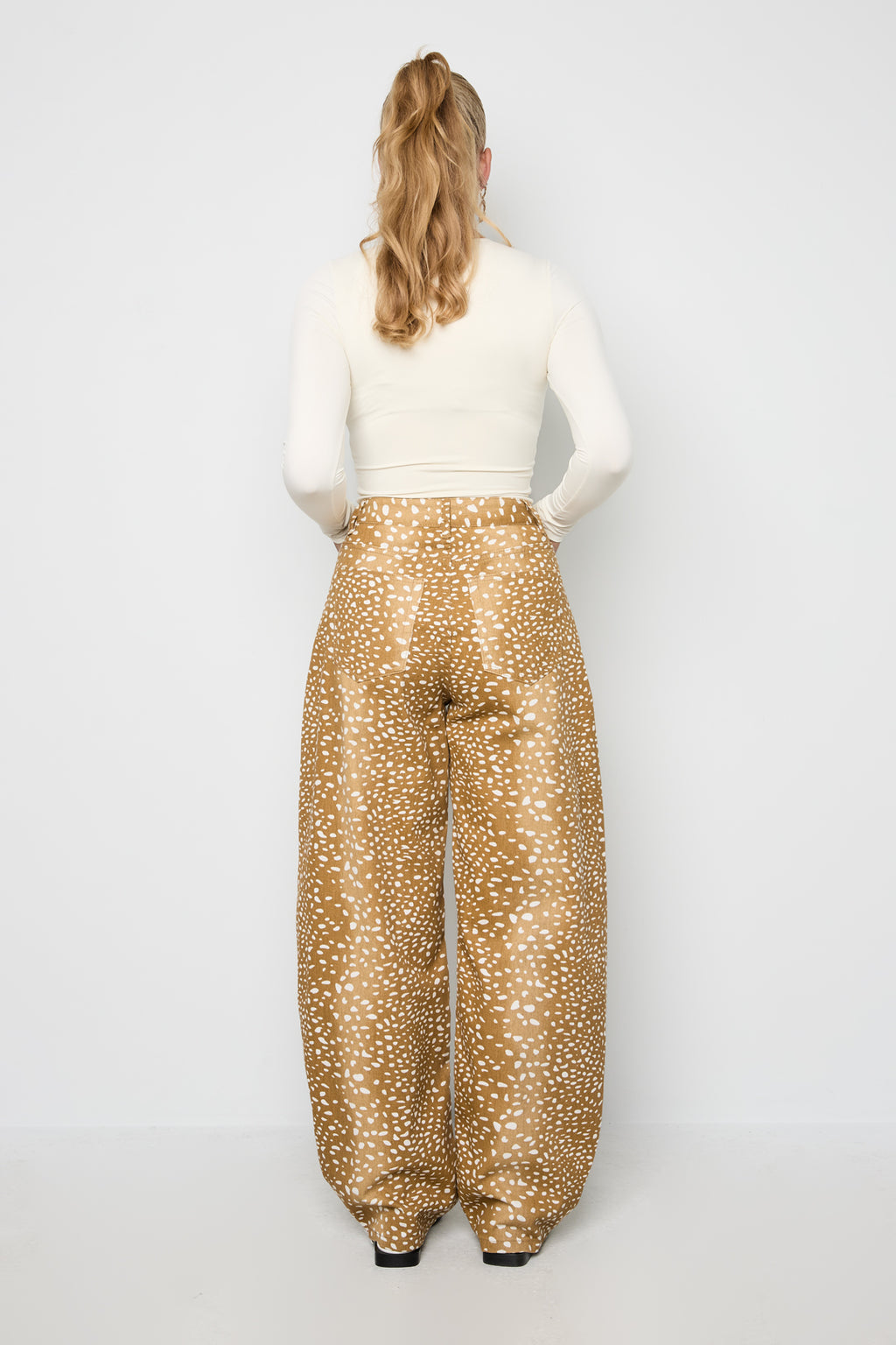 Deer-patterned jeans