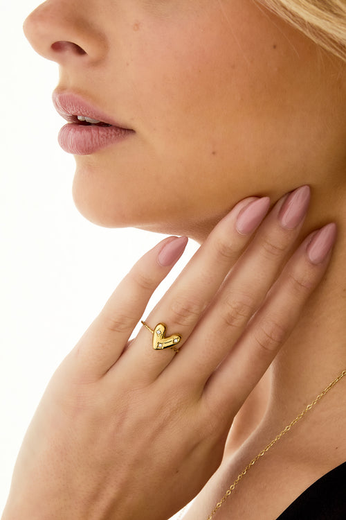 Adjustable ring with decorated heart